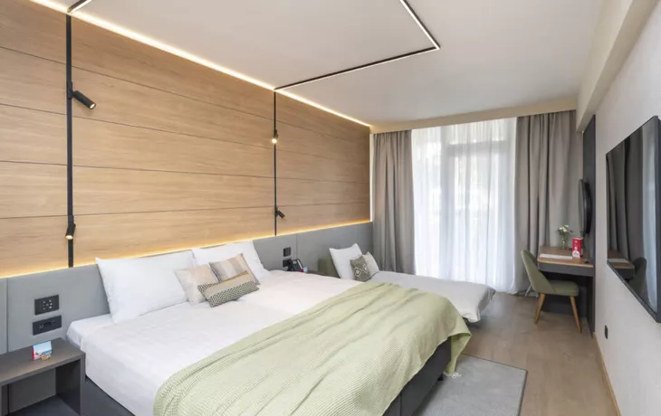 Zimmerbeispiel Doppelzimmer Classic mit Zustellbett