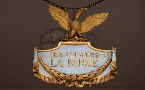 Ornament mit Adler und Schriftzug 